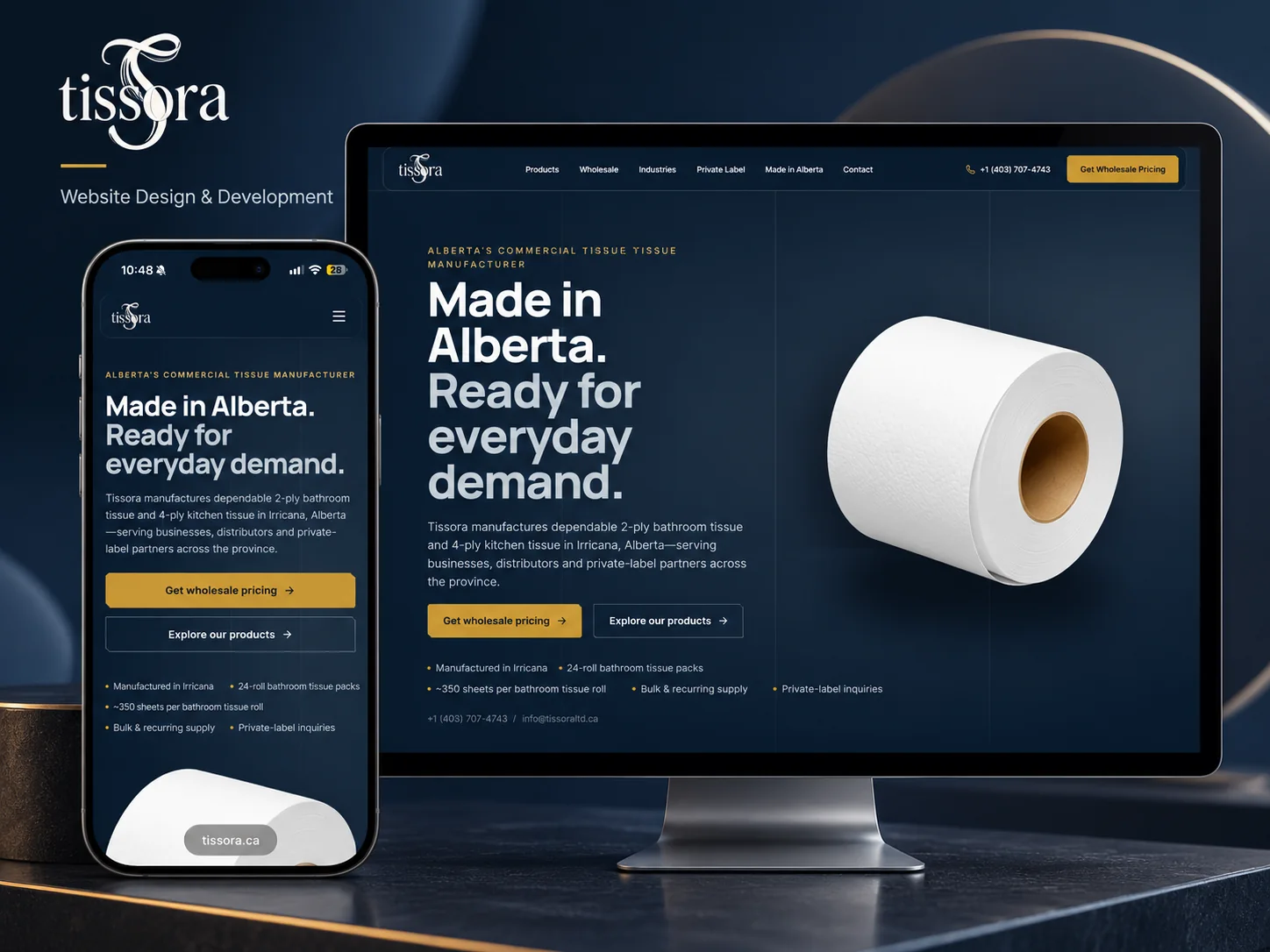 Tissora tissue manufacturing website on a monitor and phone, showing the dark navy and gold Made in Alberta homepage